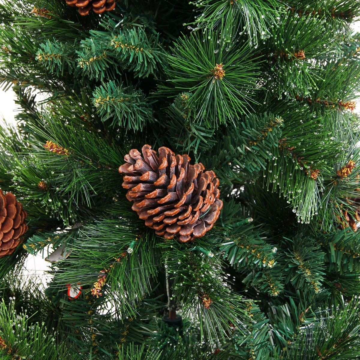 Елка светодиодная "Лесная метель" 210 см, ПВХ+леска (шишки и напыление), 1075 веток, 240 ламп LED, Теплый белый